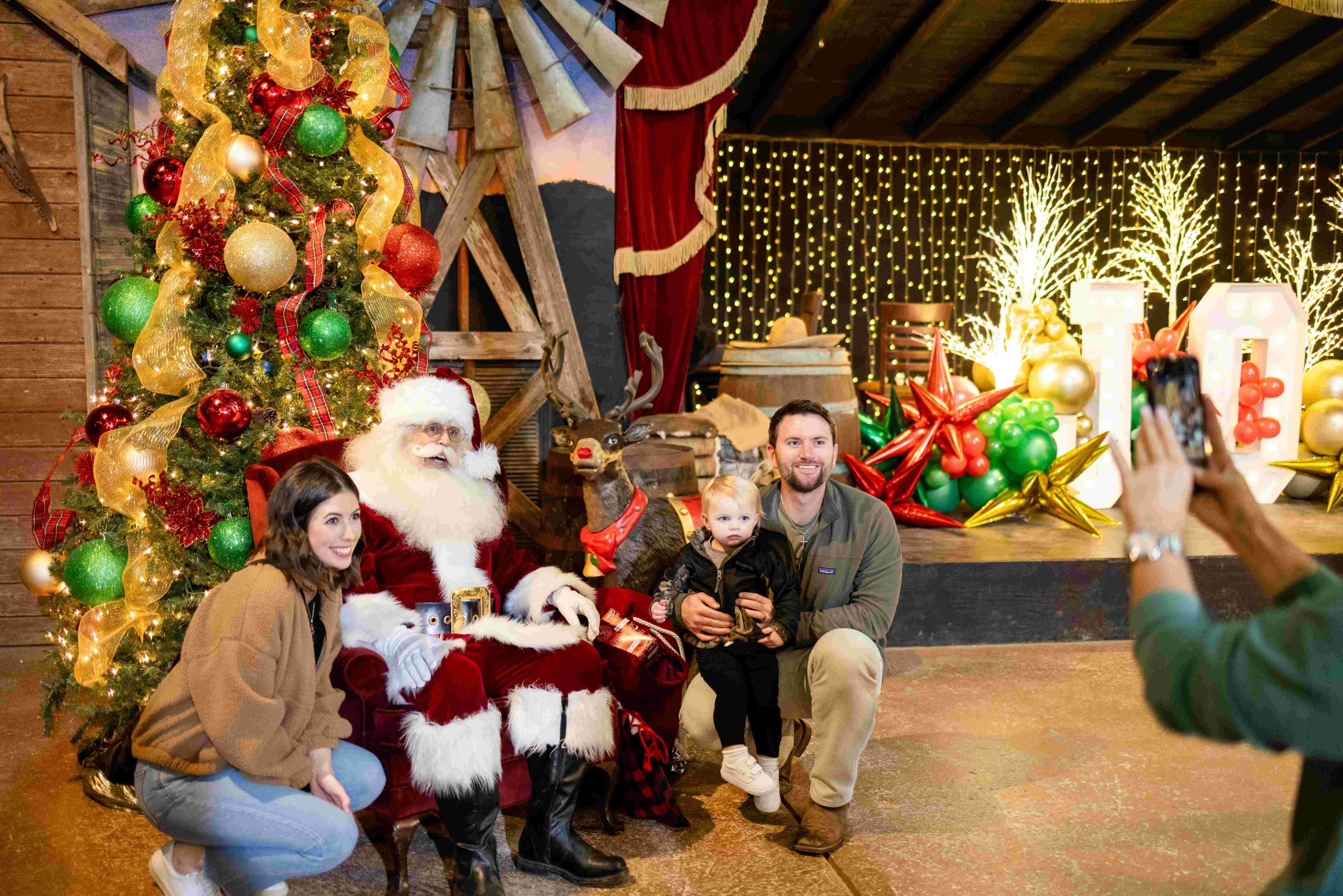 Family Photos with Santa Claus at Old West Christmas Light Fest