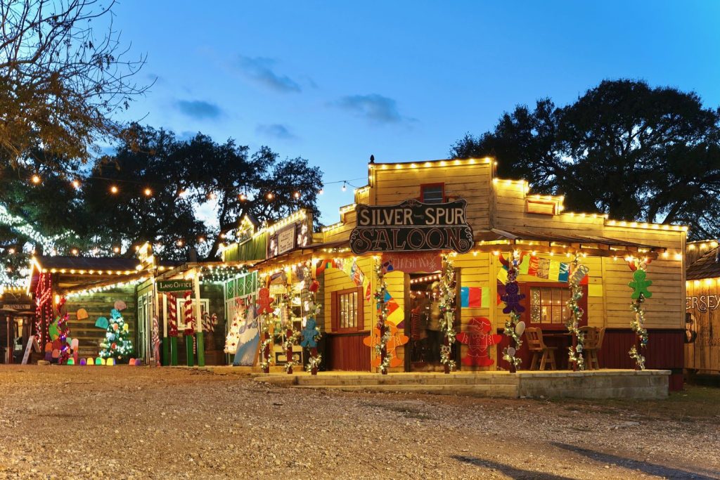 The Silver Spur Saloon lit up with Christmas lights at Old West Christmas Light Fest