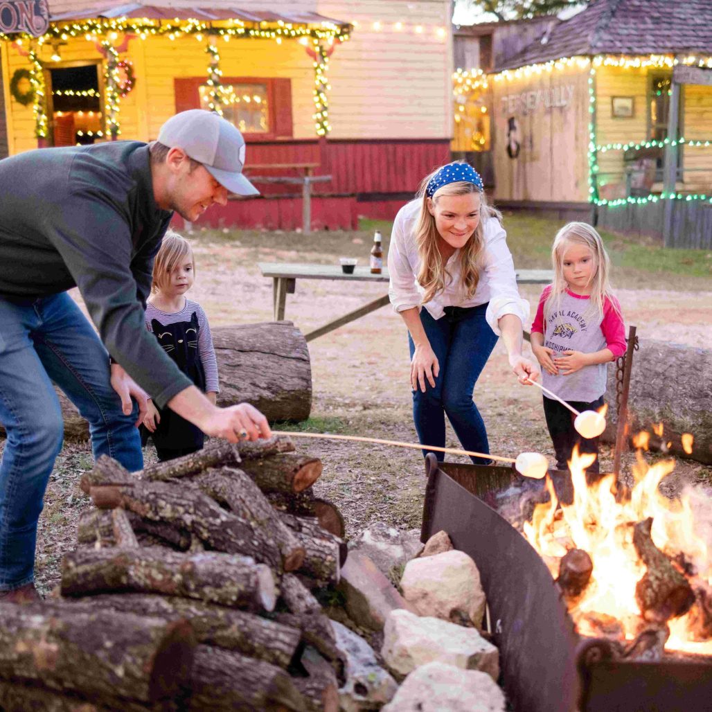 Roast s'mores at the campfires at Old West Christmas Light Fest